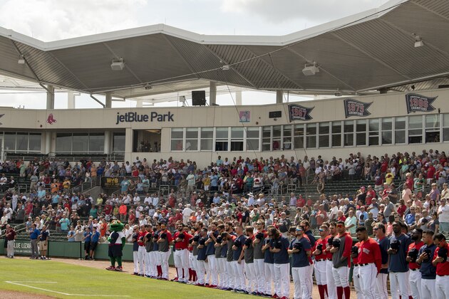 FT. MYERS, FL - FEBRUARY 25: Members of the Boston Red Sox line up before a Grapefruit League game against the Baltimore Orioles on February 25, 2020 at jetBlue Park at Fenway South in Fort Myers, Florida. (Photo by Billie Weiss/Boston Red Sox/Getty Images)