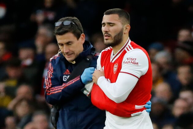 Arsenal's German-born Bosnian defender Sead Kolasinac (R) goes off with an injury during the English Premier League football match between Arsenal and Everton at the Emirates Stadium in London on February 23, 2020. (Photo by Tolga AKMEN / AFP) / RESTRICTED TO EDITORIAL USE. No use with unauthorized audio, video, data, fixture lists, club/league logos or 'live' services. Online in-match use limited to 120 images. An additional 40 images may be used in extra time. No video emulation. Social media in-match use limited to 120 images. An additional 40 images may be used in extra time. No use in betting publications, games or single club/league/player publications. / (Photo by TOLGA AKMEN/AFP via Getty Images) Arsenal's German-born Bosnian defender Sead Kolasinac (R) goes off with an injury during the English Premier League football match between Arsenal and Everton at the Emirates Stadium in London on February 23, 2020. (Photo by Tolga AKMEN / AFP) / RESTRICTED TO EDITORIAL USE. No use with unauthorized audio, video, data, fixture lists, club/league logos or 'live' services. Online in-match use limited to 120 images. An additional 40 images may be used in extra time. No video emulation. Social media in-match use limited to 120 images. An additional 40 images may be used in extra time. No use in betting publications, games or single club/league/player publications. / (Photo by TOLGA AKMEN/AFP via Getty Images)