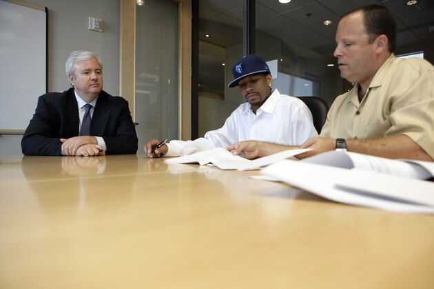 MEMPHIS, TN - SEPTEMBER 10: Chris Wallace, General Manager of the Memphis Grizzlies, Allen Iverson, of the Memphis Grizzlies and Leon Rose, agent of Allen Iverson sign his contract with the team prior to a press conference announcing his signing with the Grizzlies on September 10, 2009 at FedExForum in Memphis, Tennessee. NOTE TO USER: User expressly acknowledges and agrees that, by downloading and or using this photograph, User is consenting to the terms and conditions of the Getty Images License Agreement. Mandatory Copyright Notice: Copyright 2009 NBAE (Photo by Joe Murphy/NBAE via Getty Images) MEMPHIS, TN - SEPTEMBER 10: Chris Wallace, General Manager of the Memphis Grizzlies, Allen Iverson, of the Memphis Grizzlies and Leon Rose, agent of Allen Iverson sign his contract with the team prior to a press conference announcing his signing with the Grizzlies on September 10, 2009 at FedExForum in Memphis, Tennessee. NOTE TO USER: User expressly acknowledges and agrees that, by downloading and or using this photograph, User is consenting to the terms and conditions of the Getty Images License Agreement. Mandatory Copyright Notice: Copyright 2009 NBAE (Photo by Joe Murphy/NBAE via Getty Images)