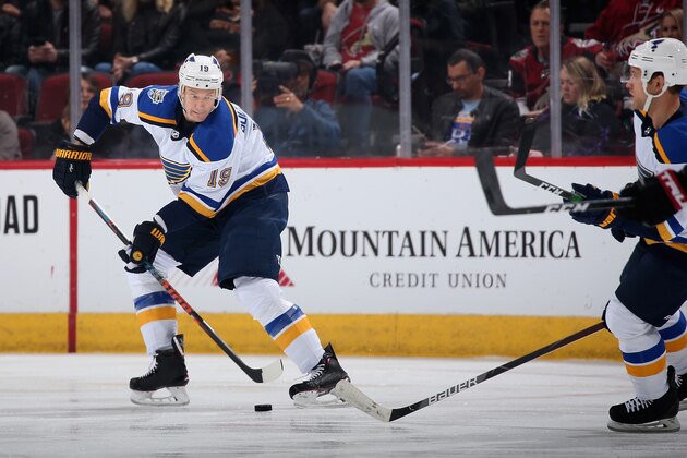 GLENDALE, ARIZONA - DECEMBER 31: Jay Bouwmeester #19 of the St. Louis Blues skates with the puck against the Arizona Coyotes during the NHL game at Gila River Arena on December 31, 2019 in Glendale, Arizona.  The Coyotes defeated the Blues 3-1.  (Photo by Christian Petersen/Getty Images)