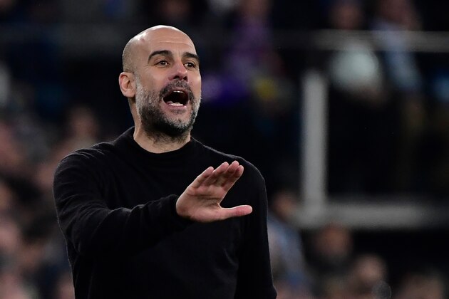Manchester City's Spanish manager Pep Guardiola gestures during the UEFA Champions League round of 16 first-leg football match between Real Madrid CF and Manchester City at the Santiago Bernabeu stadium in Madrid on February 26, 2020. (Photo by JAVIER SORIANO / AFP) (Photo by JAVIER SORIANO/AFP via Getty Images)
