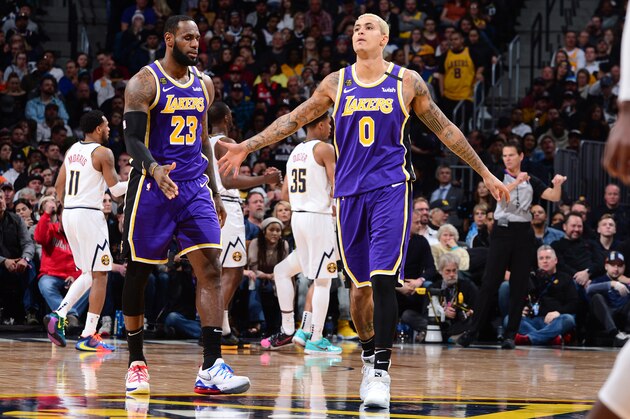 DENVER, CO - FEBRUARY 12: LeBron James #23 of the Los Angeles Lakers high-fives Kyle Kuzma #0 of the Los Angeles Lakers against the Denver Nuggets on February 12, 2020 at the Pepsi Center in Denver, Colorado. NOTE TO USER: User expressly acknowledges and agrees that, by downloading and/or using this Photograph, user is consenting to the terms and conditions of the Getty Images License Agreement. Mandatory Copyright Notice: Copyright 2020 NBAE (Photo by Bart Young/NBAE via Getty Images)