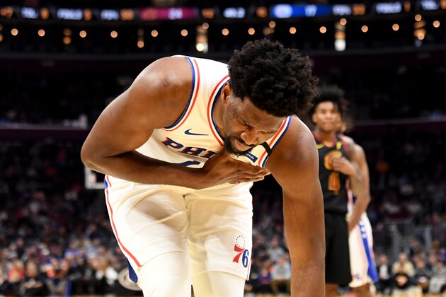 CLEVELAND, OHIO - FEBRUARY 26: Joel Embiid #21 of the Philadelphia 76ers reacts after an injury during the first half against the Cleveland Cavaliers at Rocket Mortgage Fieldhouse on February 26, 2020 in Cleveland, Ohio. NOTE TO USER: User expressly acknowledges and agrees that, by downloading and/or using this photograph, user is consenting to the terms and conditions of the Getty Images License Agreement. (Photo by Jason Miller/Getty Images)