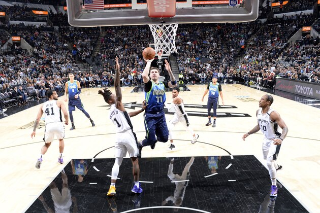 SAN ANTONIO, TX - FEBRUARY 26: Luka Doncic #77 of the Dallas Mavericks shoots the ball against the San Antonio Spurs on February 26, 2020 at the AT&T Center in San Antonio, Texas. NOTE TO USER: User expressly acknowledges and agrees that, by downloading and or using this photograph, user is consenting to the terms and conditions of the Getty Images License Agreement. Mandatory Copyright Notice: Copyright 2020 NBAE (Photos by Logan Riely/NBAE via Getty Images)