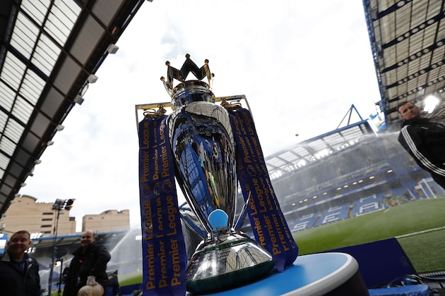 The Premier League trophy stands on display ahead of the English Premier League football match between Chelsea and Liverpool at Stamford Bridge in London on September 16, 2016. / AFP / Adrian DENNIS / RESTRICTED TO EDITORIAL USE. No use with unauthorized audio, video, data, fixture lists, club/league logos or 'live' services. Online in-match use limited to 75 images, no video emulation. No use in betting, games or single club/league/player publications.  /         (Photo credit should read ADRIAN DENNIS/AFP via Getty Images)