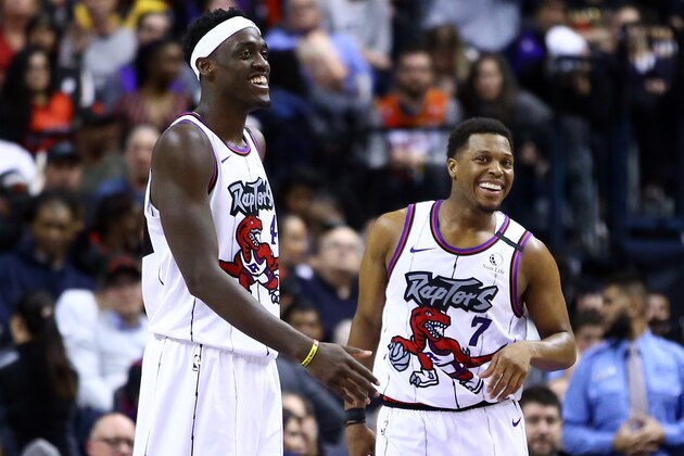 TORONTO, ON - JANUARY 28:  Pascal Siakam #43 and Kyle Lowry #7 of the Toronto Raptors laugh during the second half of an NBA game against the Atlanta Hawks at Scotiabank Arena on January 28, 2020 in Toronto, Canada.  NOTE TO USER: User expressly acknowledges and agrees that, by downloading and or using this photograph, User is consenting to the terms and conditions of the Getty Images License Agreement.  (Photo by Vaughn Ridley/Getty Images)