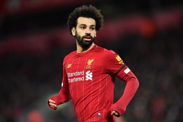 Liverpool's Egyptian midfielder Mohamed Salah reacts during the English Premier League football match between Liverpool and West Ham United at Anfield in Liverpool, north west England on February 24, 2020. (Photo by Paul ELLIS / AFP) / RESTRICTED TO EDITORIAL USE. No use with unauthorized audio, video, data, fixture lists, club/league logos or 'live' services. Online in-match use limited to 120 images. An additional 40 images may be used in extra time. No video emulation. Social media in-match use limited to 120 images. An additional 40 images may be used in extra time. No use in betting publications, games or single club/league/player publications. /  (Photo by PAUL ELLIS/AFP via Getty Images)