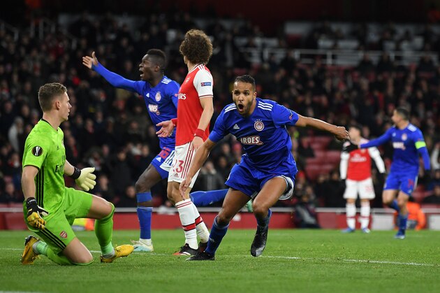 LONDON, ENGLAND - FEBRUARY 27: Youssef El Arabi of Olympiacos FC celebrates after scoring his team's second goal in extra-time during the UEFA Europa League round of 32 second leg match between Arsenal FC and Olympiacos FC at Emirates Stadium on February 27, 2020 in London, United Kingdom. (Photo by Mike Hewitt/Getty Images)