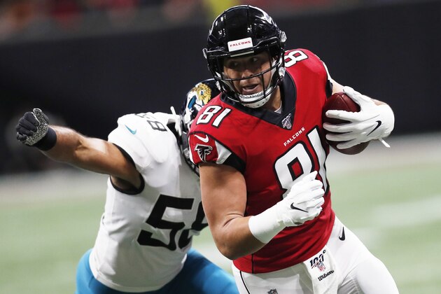 Atlanta Falcons tight end Austin Hooper (81) runs against Jacksonville Jaguars linebacker Austin Calitro (58) during the first half of an NFL football game, Sunday, Dec. 22, 2019, in Atlanta. (AP Photo/John Bazemore)