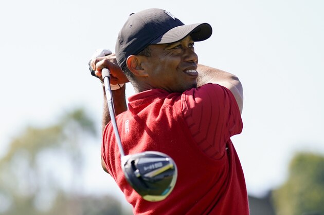 Tiger Woods tees off on the 18th hole during the final round of the Genesis Invitational golf tournament at Riviera Country Club, Sunday, Feb. 16, 2020, in the Pacific Palisades area of Los Angeles. (AP Photo/Ryan Kang) Tiger Woods tees off on the 18th hole during the final round of the Genesis Invitational golf tournament at Riviera Country Club, Sunday, Feb. 16, 2020, in the Pacific Palisades area of Los Angeles. (AP Photo/Ryan Kang)