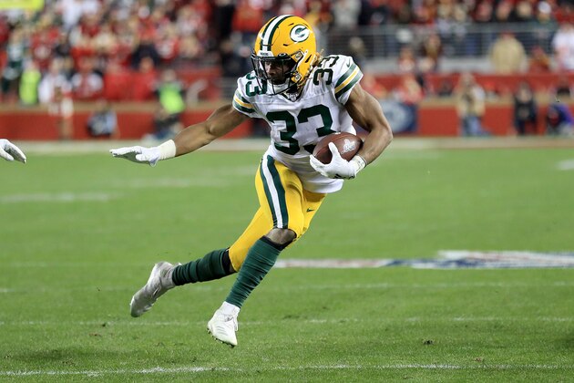 SANTA CLARA, CALIFORNIA - JANUARY 19: Aaron Jones #33 of the Green Bay Packers rushes with the ball against the San Francisco 49ers during the NFC Championship game at Levi's Stadium on January 19, 2020 in Santa Clara, California. (Photo by Sean M. Haffey/Getty Images)