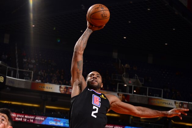 PHOENIX, AZ - FEBRUARY 26: Kawhi Leonard #2 of the LA Clippers dunks the ball against the Phoenix Suns on February 26, 2020 at Talking Stick Resort Arena in Phoenix, Arizona. NOTE TO USER: User expressly acknowledges and agrees that, by downloading and or using this photograph, user is consenting to the terms and conditions of the Getty Images License Agreement. Mandatory Copyright Notice: Copyright 2020 NBAE (Photo by Barry Gossage/NBAE via Getty Images)