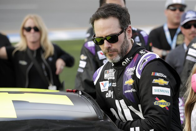 Jimmie Johnson climbs intp his car before the NASCAR Daytona 500 auto race at Daytona International Speedway, Sunday, Feb. 16, 2020, in Daytona Beach, Fla. (AP Photo/John Raoux) Jimmie Johnson climbs intp his car before the NASCAR Daytona 500 auto race at Daytona International Speedway, Sunday, Feb. 16, 2020, in Daytona Beach, Fla. (AP Photo/John Raoux)
