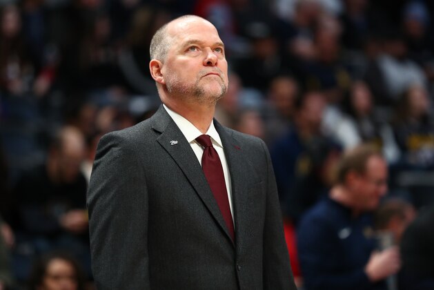 DENVER, CO - FEBRUARY 23: Michael Malone of the Denver Nuggets stands on the sidelines during warm ups before taking on the Minnesota Timberwolves at Pepsi Center on February 23, 2020 in Denver, Colorado. NOTE TO USER: User expressly acknowledges and agrees that, by downloading and or using this photograph, User is consenting to the terms and conditions of the Getty Images License Agreement. (Photo by Justin Tafoya/Getty Images)