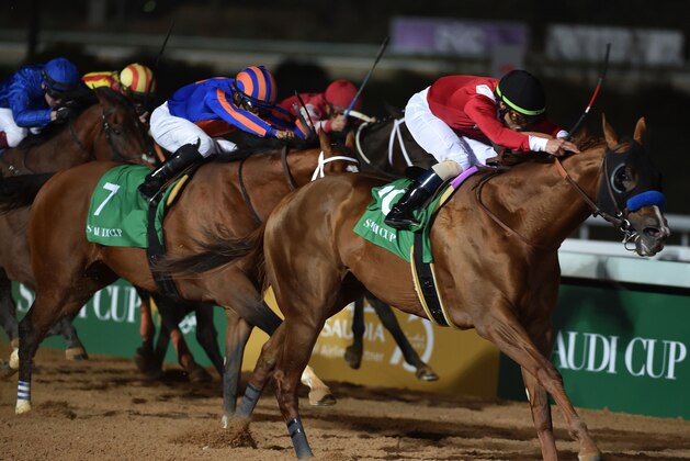 Jockey Luis Saez (L) rides his horse Maximum Security as he competes in the 20 million US dollar race, the final race of the Saudi Cup -- the world's richest horserace -- at the King Abdulaziz Racetrack in Jenadriyah near the capital Riyadh on February 29, 2020. (Photo by FAYEZ NURELDINE / AFP) (Photo by FAYEZ NURELDINE/AFP via Getty Images) Jockey Luis Saez (L) rides his horse Maximum Security as he competes in the 20 million US dollar race, the final race of the Saudi Cup -- the world's richest horserace -- at the King Abdulaziz Racetrack in Jenadriyah near the capital Riyadh on February 29, 2020. (Photo by FAYEZ NURELDINE / AFP) (Photo by FAYEZ NURELDINE/AFP via Getty Images)