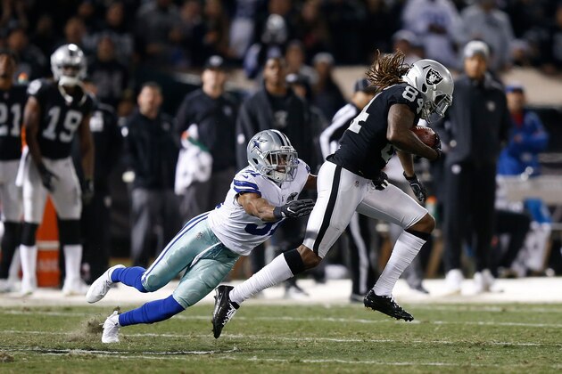 OAKLAND, CA - DECEMBER 17: Cordarrelle Patterson #84 of the Oakland Raiders is tackled by Byron Jones #31 of the Dallas Cowboys at Oakland-Alameda County Coliseum on December 17, 2017 in Oakland, California. (Photo by Lachlan Cunningham/Getty Images)