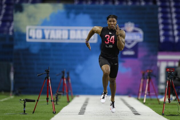 Clemson linebacker Isaiah Simmons runs the 40-yard dash at the NFL football scouting combine in Indianapolis, Saturday, Feb. 29, 2020. (AP Photo/Michael Conroy)