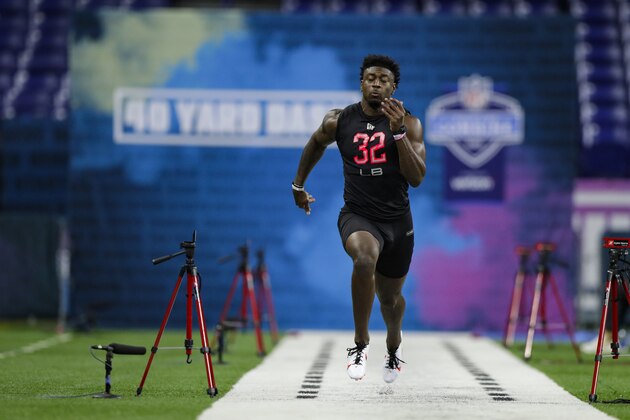 LSU linebacker Patrick Queen runs the 40-yard dash at the NFL football scouting combine in Indianapolis, Saturday, Feb. 29, 2020. (AP Photo/Michael Conroy)