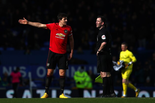 LIVERPOOL, ENGLAND - MARCH 01: Harry Maguire of Manchester United argues with referee Chris Kavanagh during the Premier League match between Everton FC and Manchester United at Goodison Park on March 01, 2020 in Liverpool, United Kingdom. (Photo by Jan Kruger/Getty Images)