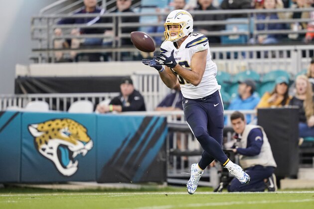 JACKSONVILLE, FLORIDA - DECEMBER 08: Hunter Henry #86 of the Los Angeles Chargers catches a pass for a touchdown during the second quarter of a game against the Jacksonville Jaguars at TIAA Bank Field on December 08, 2019 in Jacksonville, Florida. (Photo by James Gilbert/Getty Images)