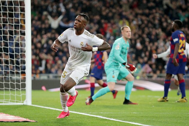 MADRID, SPAIN - MARCH 01: Vinicius Junior of Real Madrid celebrates after scoring his team's first goal during the Liga match between Real Madrid CF and FC Barcelona at Estadio Santiago Bernabeu on March 01, 2020 in Madrid, Spain. (Photo by Gonzalo Arroyo Moreno/Getty Images)