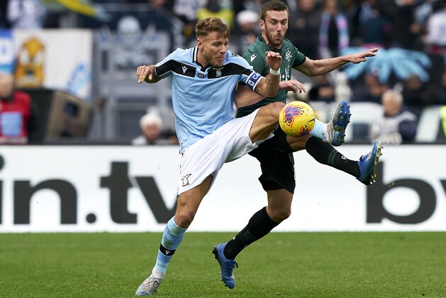 ROME, ITALY - FEBRUARY 29: Ciro Immobile of Lazio competes for the ball with Mattia Bani of Bologna during the Serie A match between SS Lazio and Bologna FC at Stadio Olimpico on February 29, 2020 in Rome, Italy. (Photo by Danilo Di Giovanni/Quality Sport Images/Getty Images)