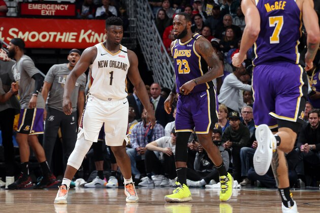 NEW ORLEANS, LA - MARCH 1: Zion Williamson #1 of the New Orleans Pelicans and LeBron James #23 of the Los Angeles Lakers look on during the game on March 1, 2020 at the Smoothie King Center in New Orleans, Louisiana. NOTE TO USER: User expressly acknowledges and agrees that, by downloading and or using this Photograph, user is consenting to the terms and conditions of the Getty Images License Agreement. Mandatory Copyright Notice: Copyright 2020 NBAE (Photo by Layne Murdoch Jr./NBAE via Getty Images)