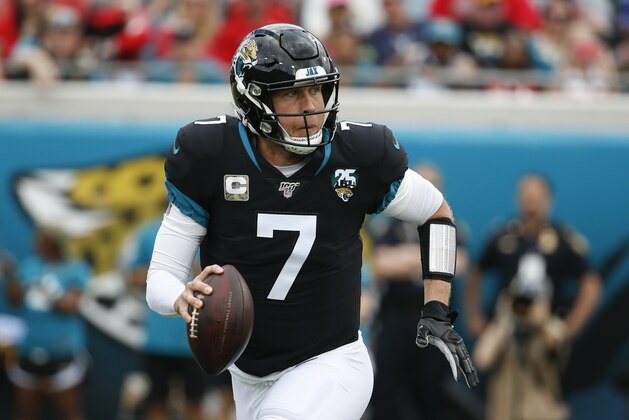 Jacksonville Jaguars quarterback Nick Foles (7) looks for a receiver against the Tampa Bay Buccaneers during the first half of an NFL football game, Sunday, Dec. 1, 2019, in Jacksonville, Fla. (AP Photo/Stephen B. Morton)