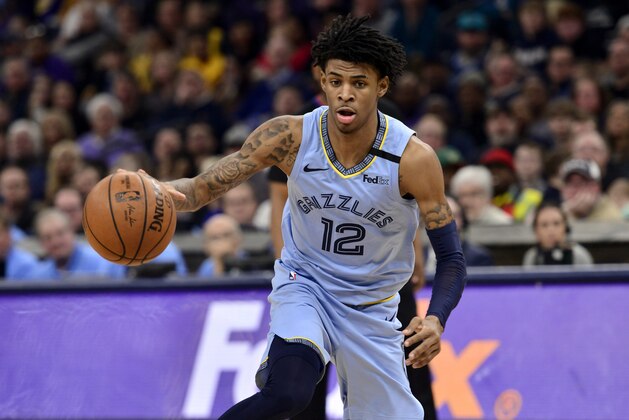 Memphis Grizzlies guard Ja Morant (12) plays in the first half of an NBA basketball game against the Los Angeles Lakers Saturday, Feb. 29, 2020, in Memphis, Tenn. (AP Photo/Brandon Dill)