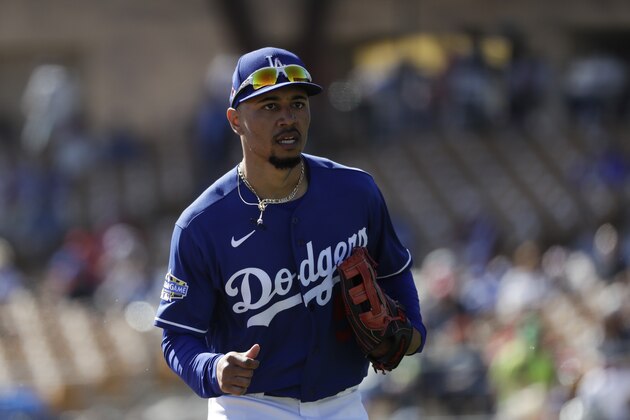 Los Angeles Dodgers right fielder Mookie Betts during the first inning of a spring training baseball game against the Los Angeles Angels, Wednesday, Feb. 26, 2020, in Glendale, Ariz. (AP Photo/Gregory Bull)