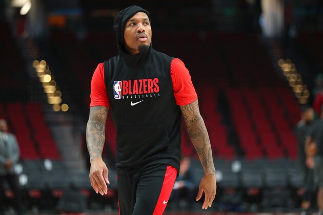 PORTLAND, OREGON - FEBRUARY 25: Damian Lillard #0 of the Portland Trail Blazers warms up prior to their game against the Boston Celtics at Moda Center on February 25, 2020 in Portland, Oregon. NOTE TO USER: User expressly acknowledges and agrees that, by downloading and or using this photograph, User is consenting to the terms and conditions of the Getty Images License Agreement. (Photo by Abbie Parr/Getty Images)