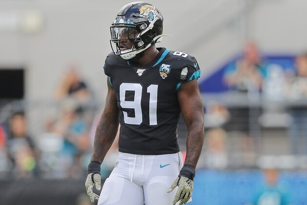 JACKSONVILLE, FLORIDA - DECEMBER 01: Yannick Ngakoue #91 of the Jacksonville Jaguars looks on during the second quarter of a game against the Tampa Bay Buccaneers at TIAA Bank Field on December 01, 2019 in Jacksonville, Florida. (Photo by James Gilbert/Getty Images)