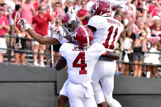 NASHVILLE, TN - SEPTEMBER 23: Jerry Jeudy #4 and Henry Ruggs III #11 of the Alabama Crimson Tide celebrates with DeVonta Smith #6 after his scoring a touchdown against the Vanderbilt Commodores during the second half at Vanderbilt Stadium on September 23, 2017 in Nashville, Tennessee.  (Photo by Frederick Breedon/Getty Images)
