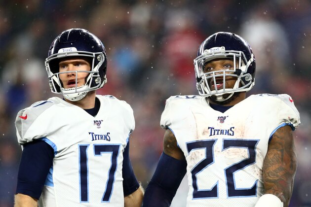 FOXBOROUGH, MASSACHUSETTS - JANUARY 04: Ryan Tannehill #17 of the Tennessee Titans and Derrick Henry #22 look on in the AFC Wild Card Playoff game against the New England Patriots at Gillette Stadium on January 04, 2020 in Foxborough, Massachusetts. (Photo by Adam Glanzman/Getty Images)