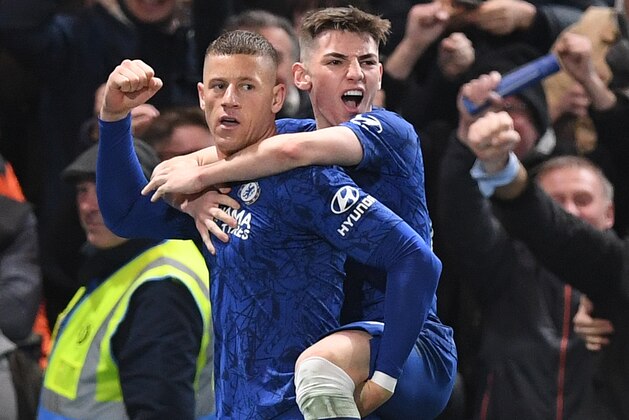 Chelsea's English midfielder Ross Barkley (L) celebrates scoring his team's second goal with Chelsea's Scottish midfielder Billy Gilmour during the English FA Cup fifth round football match between Chelsea and Liverpool at Stamford Bridge in London on March 3, 2020. (Photo by DANIEL LEAL-OLIVAS / AFP) / RESTRICTED TO EDITORIAL USE. No use with unauthorized audio, video, data, fixture lists, club/league logos or 'live' services. Online in-match use limited to 120 images. An additional 40 images may be used in extra time. No video emulation. Social media in-match use limited to 120 images. An additional 40 images may be used in extra time. No use in betting publications, games or single club/league/player publications. /  (Photo by DANIEL LEAL-OLIVAS/AFP via Getty Images)