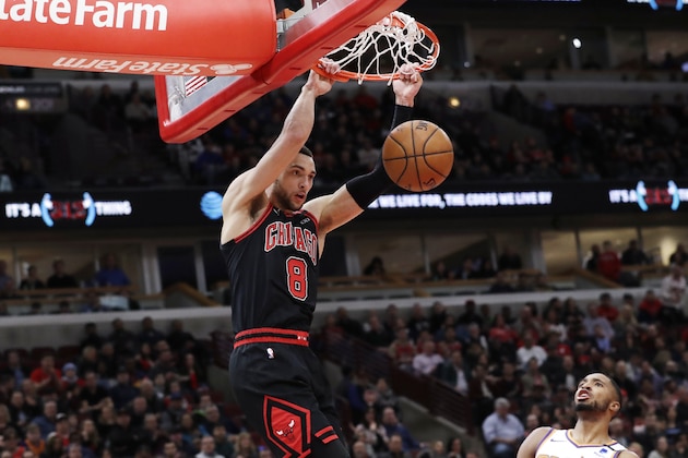 Chicago Bulls guard Zach LaVine dunks against the Phoenix Suns during the first half of an NBA basketball game in Chicago, Saturday, Feb. 22, 2020. (AP Photo/Nam Y. Huh)