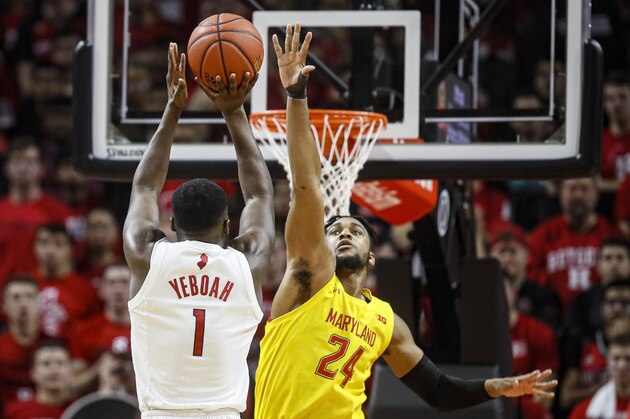 Rutgers' Akwasi Yeboah (1) shoots as Maryland's Donta Scott (24) defends during the first half of an NCAA college basketball game Tuesday, March 3, 2020, in Piscataway, N.J. (AP Photo/John Minchillo)