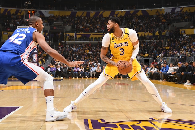 LOS ANGELES, CA - MARCH 3: Anthony Davis #3 of the Los Angeles Lakers handles the ball against the Philadelphia 76ers on March 03, 2020 at STAPLES Center in Los Angeles, California. NOTE TO USER: User expressly acknowledges and agrees that, by downloading and/or using this Photograph, user is consenting to the terms and conditions of the Getty Images License Agreement. Mandatory Copyright Notice: Copyright 2020 NBAE (Photo by Andrew D. Bernstein/NBAE via Getty Images)