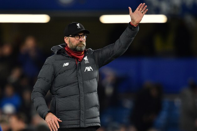 Liverpool's German manager Jurgen Klopp applauds the fans following the English FA Cup fifth round football match between Chelsea and Liverpool at Stamford Bridge in London on March 3, 2020. - Chelsea won the match 2-0. (Photo by Glyn KIRK / AFP) / RESTRICTED TO EDITORIAL USE. No use with unauthorized audio, video, data, fixture lists, club/league logos or 'live' services. Online in-match use limited to 120 images. An additional 40 images may be used in extra time. No video emulation. Social media in-match use limited to 120 images. An additional 40 images may be used in extra time. No use in betting publications, games or single club/league/player publications. /  (Photo by GLYN KIRK/AFP via Getty Images)