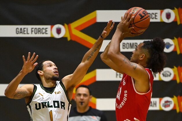 LOS ANGELES, CA - JULY 13:  Jamal Camilo #1 of the Utah Valor defends a shot by Buddha Boyd #10 of the Fort Hood Wounded Warriors  as he goes for a basket in the West Regional of The Basketball Tournament (TBT) at Eagle's Nest Arena on July 13, 2018 in Los Angeles, California.  (Photo by Jayne Kamin-Oncea/Getty Images)