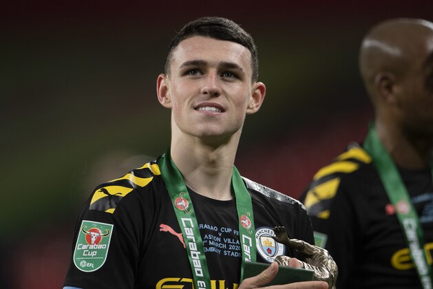 LONDON, ENGLAND - MARCH 01: Phil Foden of Manchester City celebrates victory after the Carabao Cup Final between Aston Villa and Manchester City at Wembley Stadium on March 01, 2020 in London, England. (Photo by Visionhaus)