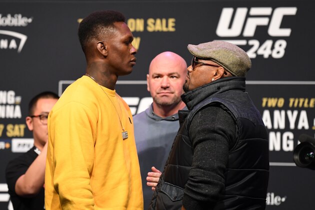 HOUSTON, TX - FEBRUARY 07:  (L-R) Israel Adesanya and Yoel Romero face off during the UFC 248 Press Conference at the Toyota Center on February 7, 2020 in Houston, Texas. (Photo by Josh Hedges/Zuffa LLC via Getty Images)