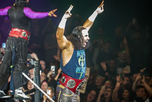 Hardy Boyz celebrate victory during WWE show at Zenith Arena on May 10, 2017 in Lille, northern France. / AFP PHOTO / PHILIPPE HUGUEN        (Photo credit should read PHILIPPE HUGUEN/AFP via Getty Images)