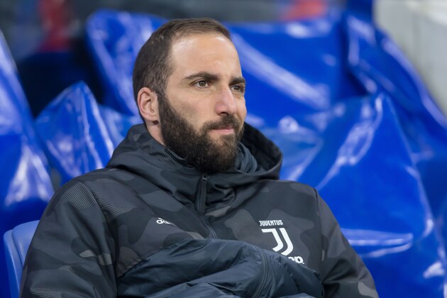 LYON, FRANCE - FEBRUARY 26: (BILD ZEITUNG OUT) Gonzalo Higuain of Juventus sits on the bench during the UEFA Champions League round of 16 first leg match between Olympique Lyon and Juventus at Parc Olympique on February 26, 2020 in Lyon, France. (Photo by Harry Langer/DeFodi Images via Getty Images)