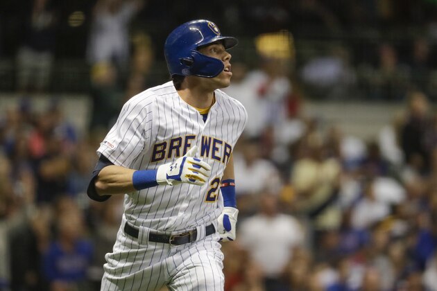 Milwaukee Brewers' Christian Yelich hits a three-run home run during the third inning of a baseball game against the Chicago Cubs Friday, Sept. 6, 2019, in Milwaukee. (AP Photo/Morry Gash)