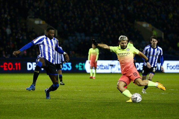 SHEFFIELD, ENGLAND - MARCH 04: Sergio Aguero of Manchester City Shoots and scores a goal to make it 1-0 during the FA Cup Fifth Round match between Sheffield Wednesday and Manchester City at Hillsborough on March 4, 2020 in Sheffield, England. (Photo by Robbie Jay Barratt - AMA/Getty Images)