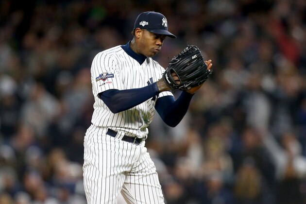 NEW YORK, NEW YORK - OCTOBER 18: Aroldis Chapman #54 of the New York Yankees looks on against the Houston Astros during the ninth inning in game five of the American League Championship Series at Yankee Stadium on October 18, 2019 in New York City. (Photo by Mike Stobe/Getty Images)