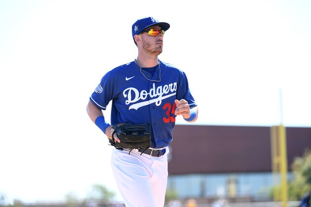 GLENDALE, ARIZONA - FEBRUARY 26: Cody Bellinger #35 of the Los Angeles Dodgers runs into the dugout from the outfield during a spring training game against the Los Angeles Angels at Camelback Ranch on February 26, 2020 in Glendale, Arizona. (Photo by Norm Hall/Getty Images) GLENDALE, ARIZONA - FEBRUARY 26: Cody Bellinger #35 of the Los Angeles Dodgers runs into the dugout from the outfield during a spring training game against the Los Angeles Angels at Camelback Ranch on February 26, 2020 in Glendale, Arizona. (Photo by Norm Hall/Getty Images)