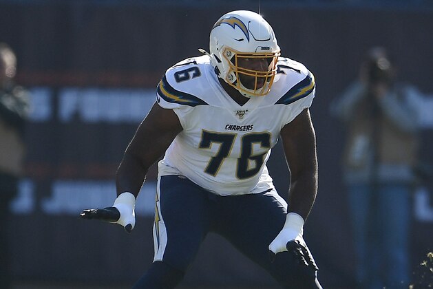 CHICAGO, ILLINOIS - OCTOBER 27:  Russell Okung #76 of the Los Angeles Chargers reacts to a play during a game against the Chicago Bears at Soldier Field on October 27, 2019 in Chicago, Illinois. The Chargers defeated the Bears 17-16.  (Photo by Stacy Revere/Getty Images)