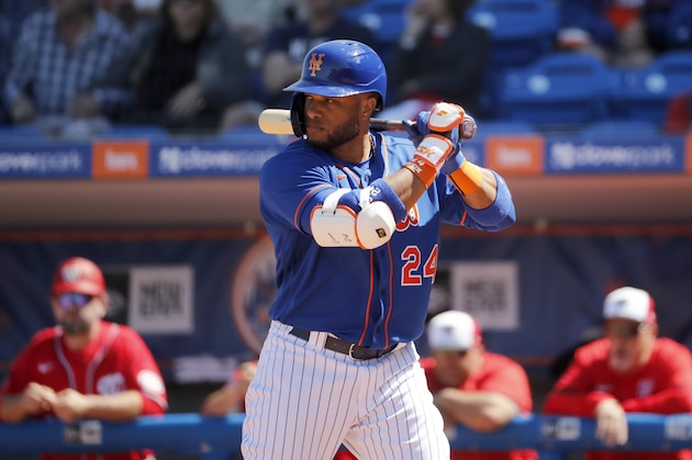 New York Mets' Robinson Cano bats during the first inning of a spring training baseball game against the Washington Nationals Sunday, March 1, 2020, in Port St. Lucie, Fla. (AP Photo/Jeff Roberson)